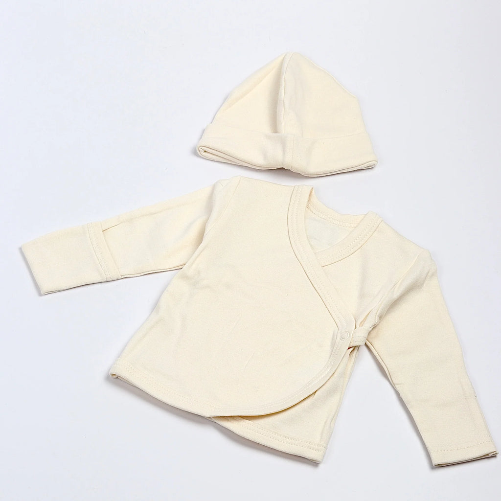 Baby Cardigan and Cap by Fog Linen.
