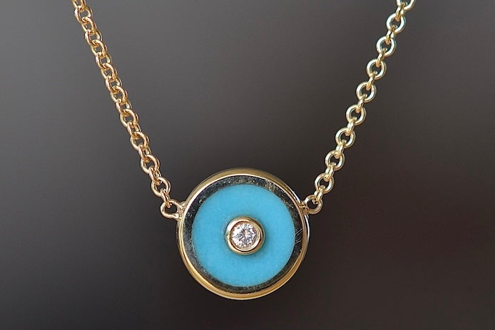 Retrouvai Mini compass pendant in turquoise.