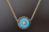 Retrouvai Mini compass pendant in turquoise.