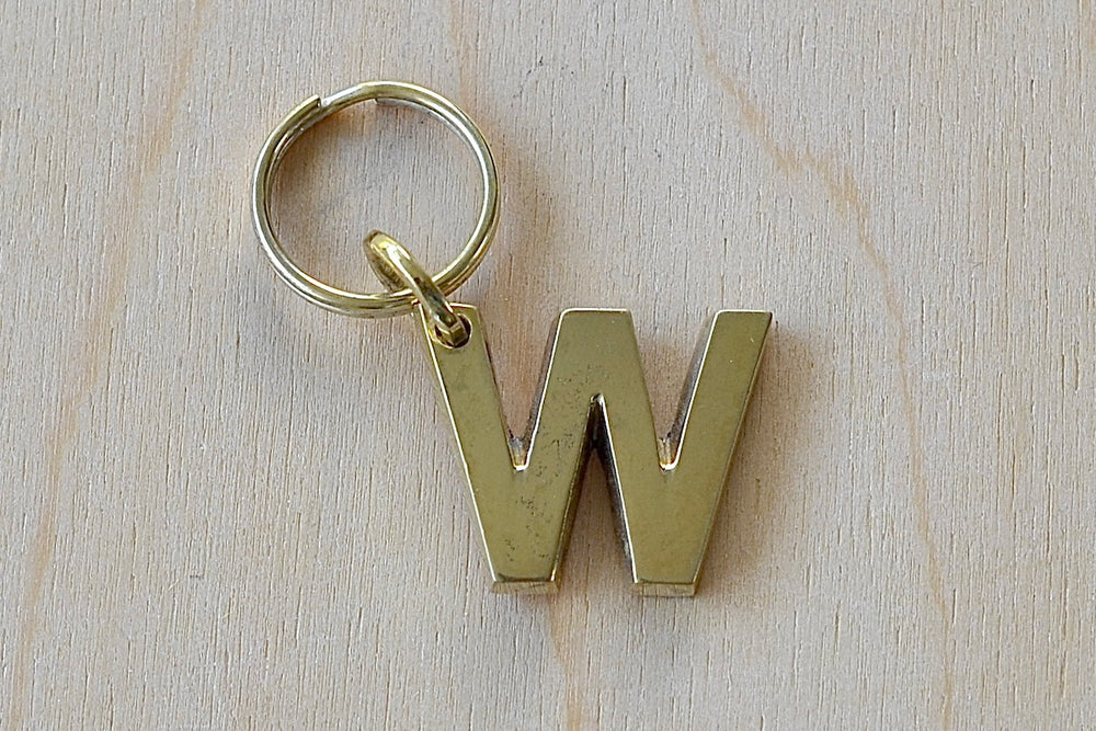 'W' Letter keyring, key chain, key ring in brass made by Carl Aubock. 