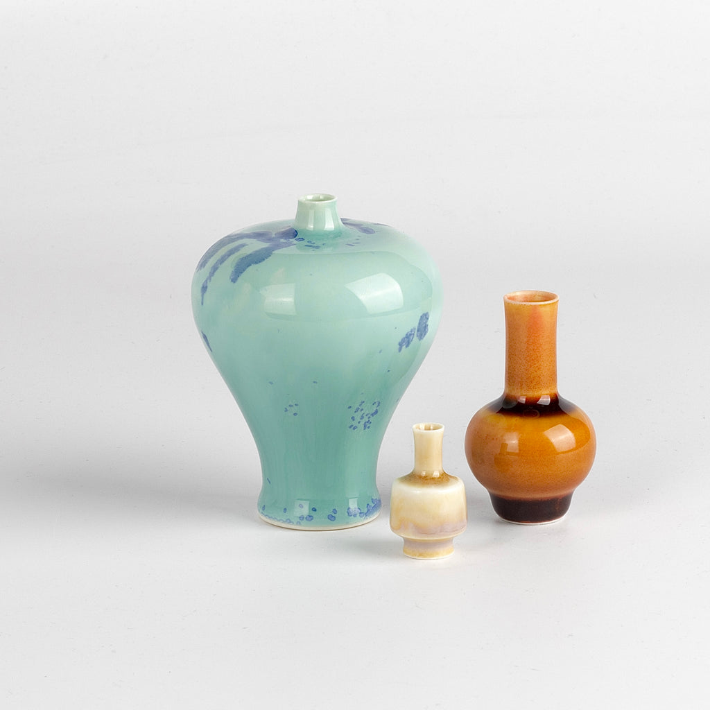 Miniature Hand Thrown Ceramic Vase Trio in Turquoise, Burnt Peach and Cream are three tiny and hand thrown ceramic vases hand thrown by Japanese born, UK based potter Yuta Segawa