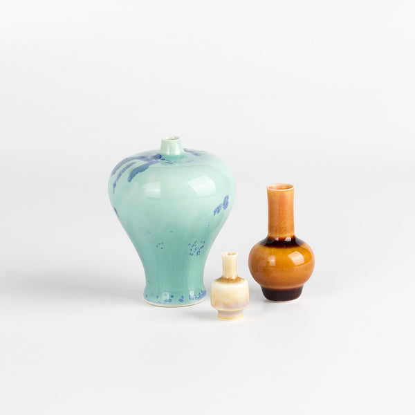 Miniature Hand Thrown Ceramic Vase Trio in Turquoise, Burnt Peach and Cream are three tiny and hand thrown ceramic vases hand thrown by Japanese born, UK based potter Yuta Segawa
