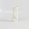 showing one white and distorted medium vase by Yuta Segawa.