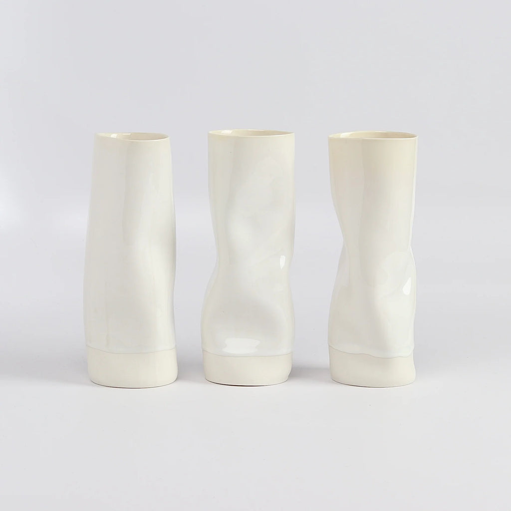 Distorted and all white medium Yuta Segawa Cylinder vases.