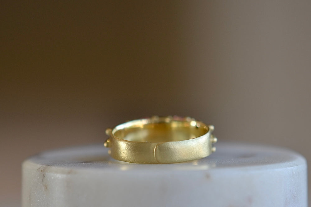 Back view of Rainbow Daisy Garland Ring designed by Polly Wales.