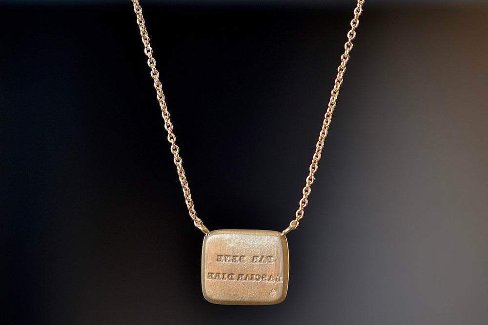 Pain Makes Me Fly Duo Motto Necklace by Makiko Wakita back reads In Italian, “FAR BENE LASCIAR DIRE” (‘Do well Let say’)