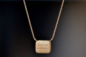 Pain Makes Me Fly Duo Motto Necklace by Makiko Wakita back reads In Italian, “FAR BENE LASCIAR DIRE” (‘Do well Let say’)