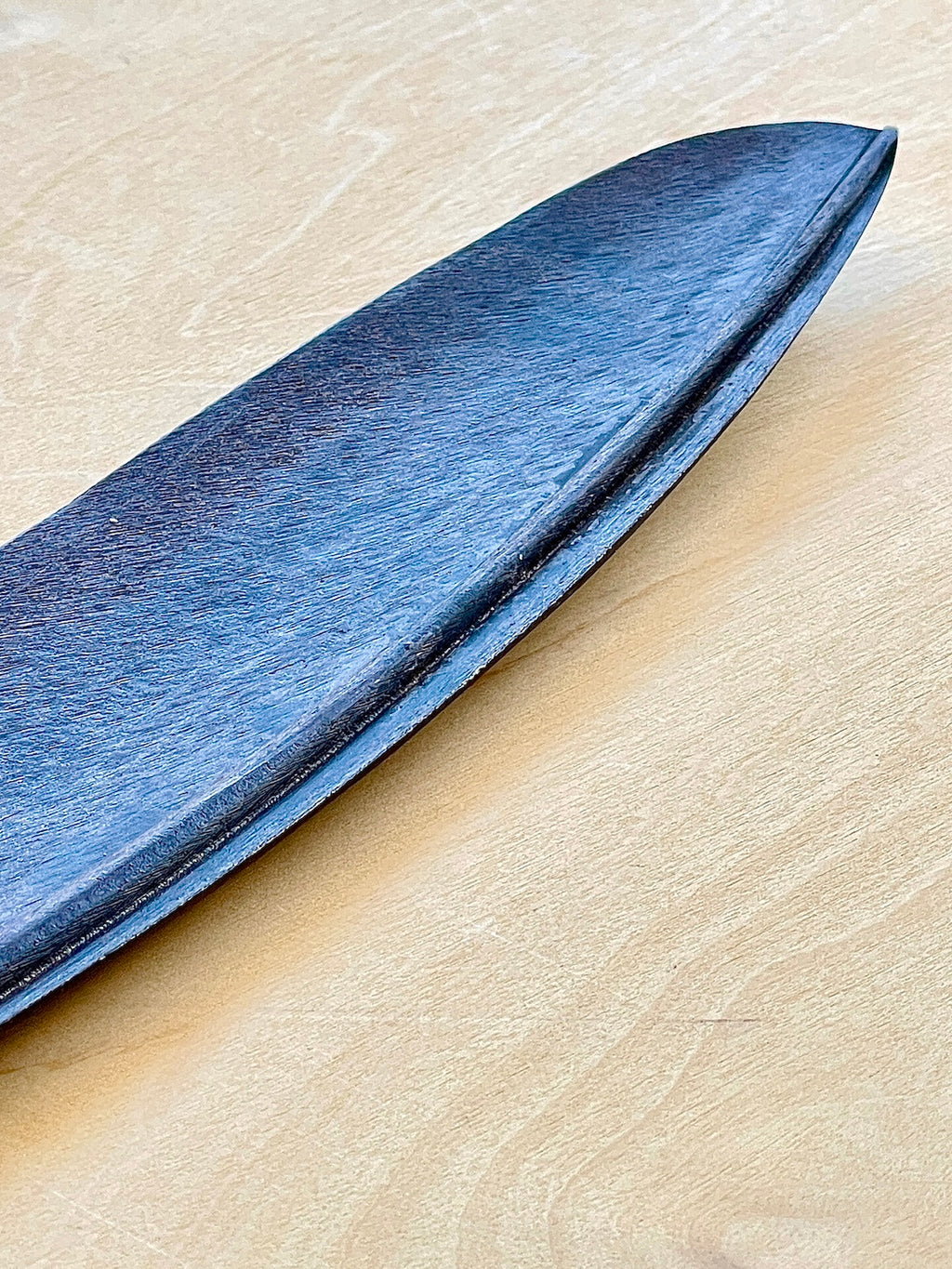 Detail of feder, feather sculpture by Carl Aubock.