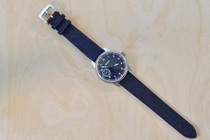 Full view of Weiss Watch 42mm Standard Issue Field Watch with Black Dial, shown with black canvas strap is manually wound, made with American parts, featuring Super Luminova hands and markers.