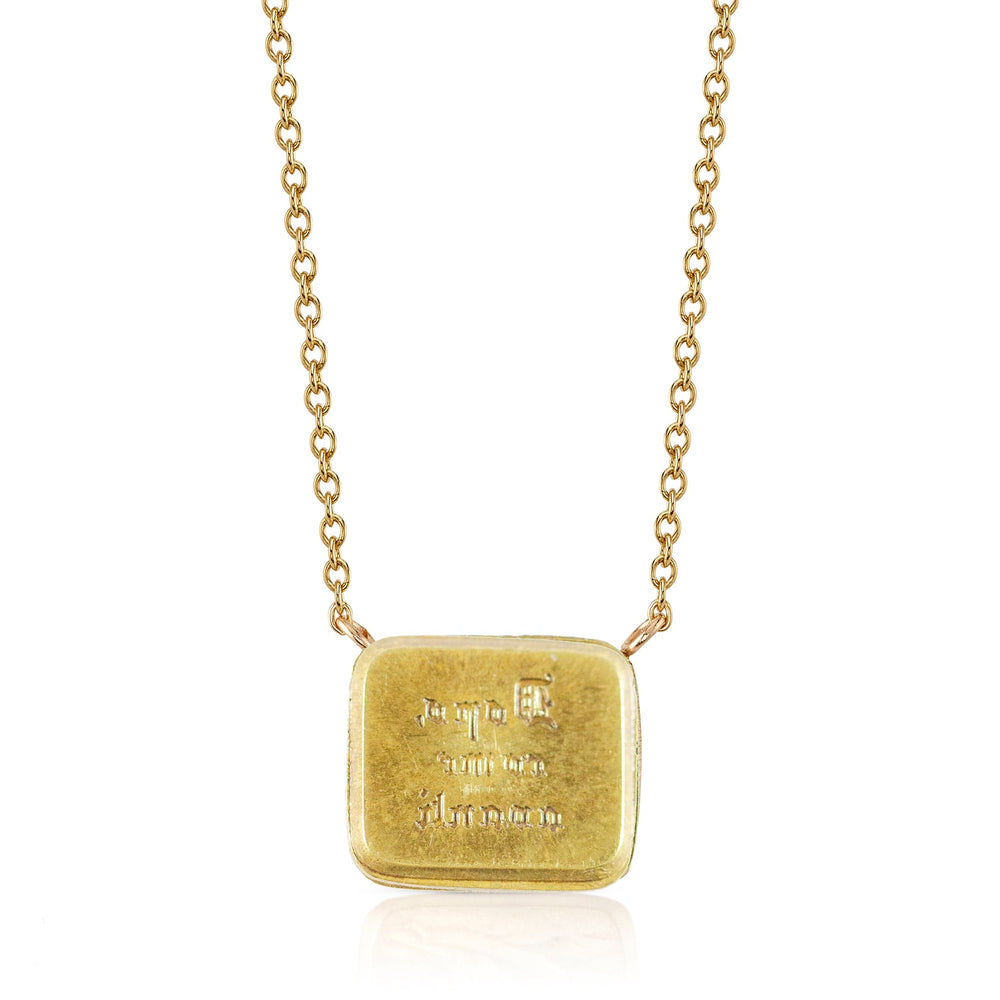 Reverse side of Lion and the Mouse Duo Motto Necklace by Makita Wakita in 18k yellow gold on white background. 