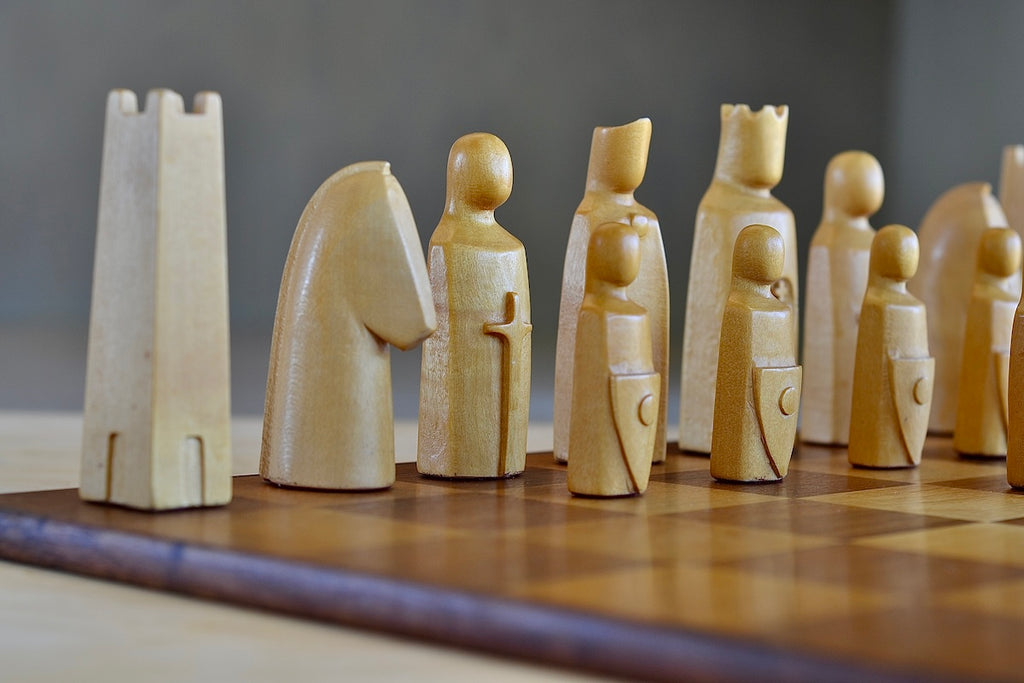 Light Elsinore hand carved pieces in Alpine maple. 