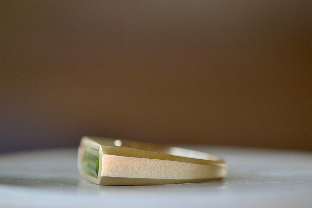 Side view of Peridot Bar signet ring by Elizabeth Street Jewelry.