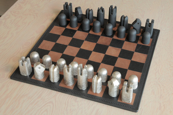 Carl Aubock Modernist Chess Board and pieces sold as a set at OK store in Los Angeles.