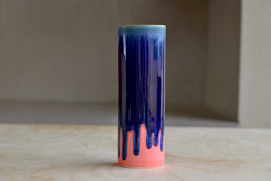 Dark blue and peach cylinder vase by Yuta Segawa.