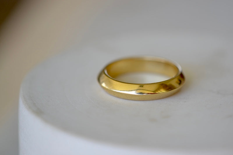 Basic Double Row Knife Edge Band by Lizzie Mandler is a 4mm unisex wedding band  in 18k yellow gold. Handmade in Los Angeles.