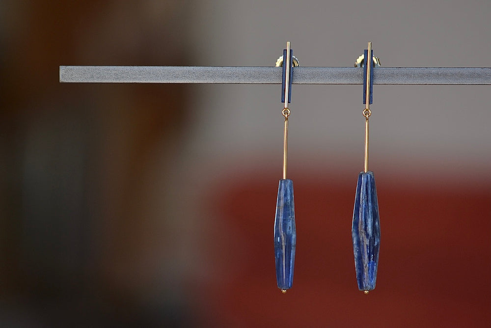 Lapis and Kyanite on Stick and Strand Earrings by Kathleen Whitaker are One of a kind kyanite stones with natural inclusions that are drilled and prism shaped and attached to Kathleen Whitaker's signature stick and strand with post closure. Stone collection.