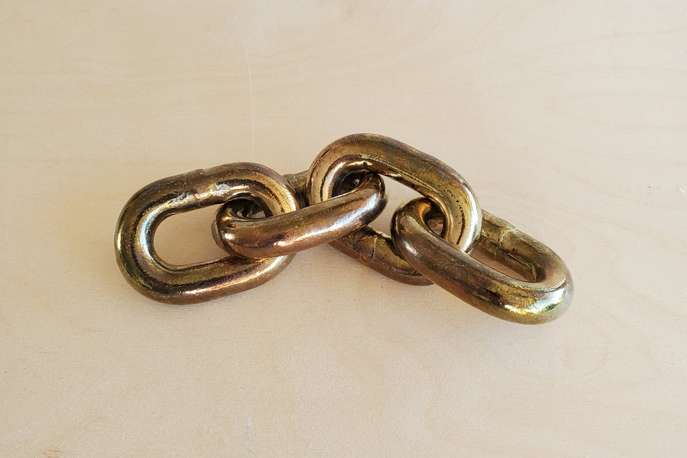 Aubock Paperweight "Chain" 5072 in brass.