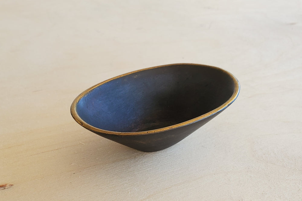 Carl Aubock Little Oval Cup in patinad brass.