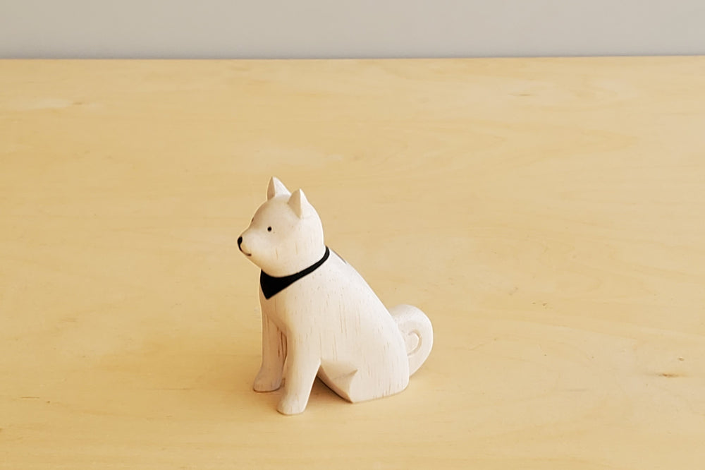 T-lab wooden animals are handmade in Bali from albizia wood, a lightweight fast-growing wood from the South Pacific. A dog with black bandana.
