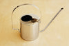 Stelton Danish Modern Watering Can desigend by Peter Holmblad in stainless steel.