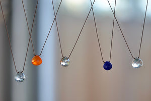 Five Faceted Zen Gem Necklaces from the back.  Designed by Margaret Solow. Handmade in Los Angeles.