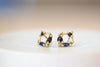 Polly Wales Des Goutes de Rosee Stud Earrings studs in Midnight Fade 18k Yellow Recycled Gold Blue and black sapphires and white diamonds. 