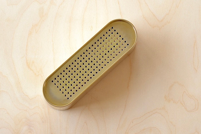 The 001 Stack Burner is a three tiered incense burner in polished brass. The top is a vent, the middle has space for up to three sticks to burn, and the bottom is extra storage. It is as posh as posh gets and we will include a box of our favorite incense. Designed by Populus Project in Canada.