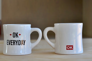 Two OK Mugs side by side.