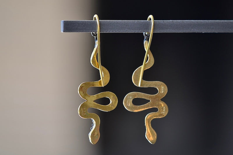 Snake Drop Earrings by Arman Sarkyssian are 22k gold snakes with oxidized sterling silver details, accent  pavé diamonds and engraved details on earring hooks. From the back.
