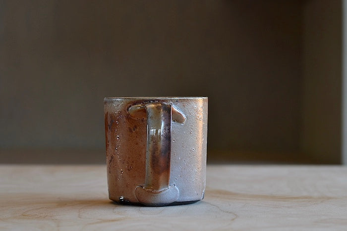 Handle of Wood Fired Mug "C" by Lindsey Oesterritter.