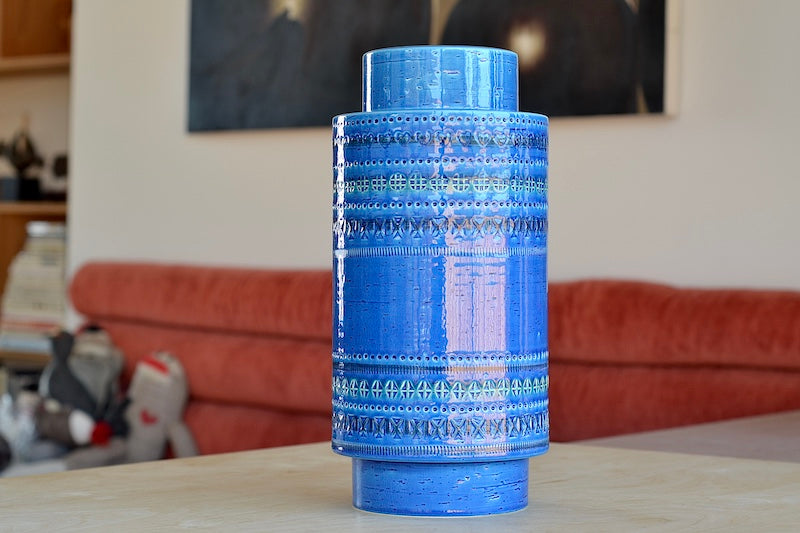 Rimini Blu Plinth vase is Current production of the "Rimini Blu" series. Designed between 1955 and 1965 by by Aldo Londi. This vase is hand made in Italy and one of a kind, made in ceramic earthenware and with a blue glaze and 13" tall..