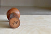 Lovely vintage artisan Kokeshi doll by well known woodworker Kuribayashi Issetsu, founding father of Sosaku-Creative Movement.  Handmade in Japan. Painted and part of his "Mugen" series.