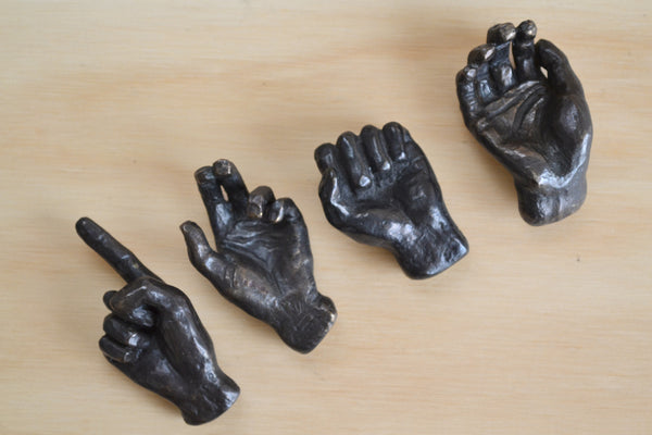 Bronze Objects Small "Hands" sculpture objects by Anne Ricketts.