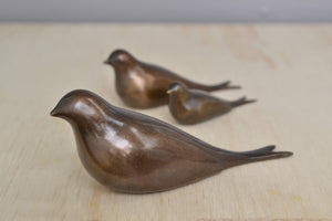 Bronze Objects "Swallows" by Anne Ricketts in three sizes.