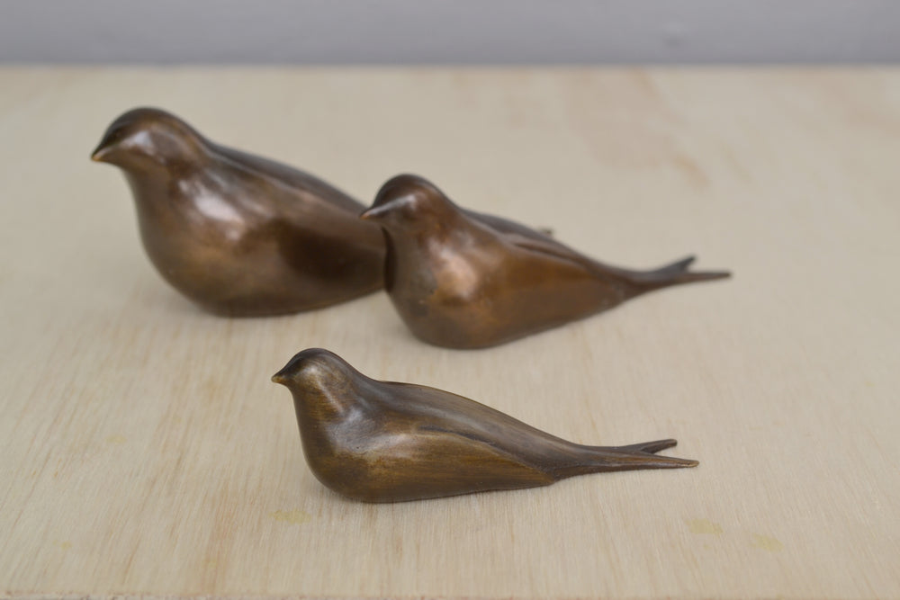 Bronze Objects "Swallows" by Anne Ricketts in three sizes.