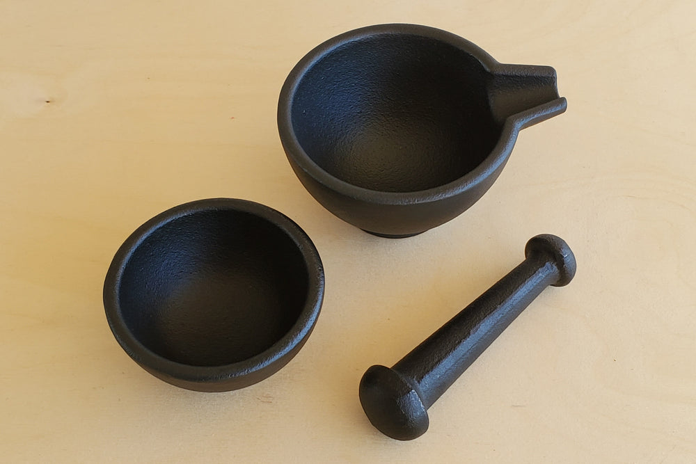 Cast Iron Mortar and Pestle from Zassenhaus Sturdy solid cast iron construction.  Mortar, pestle and stacked n bowl.  Designed in Germany, produced to a high European standard of quality.  Functional and attractive.  Will last a lifetime. 
