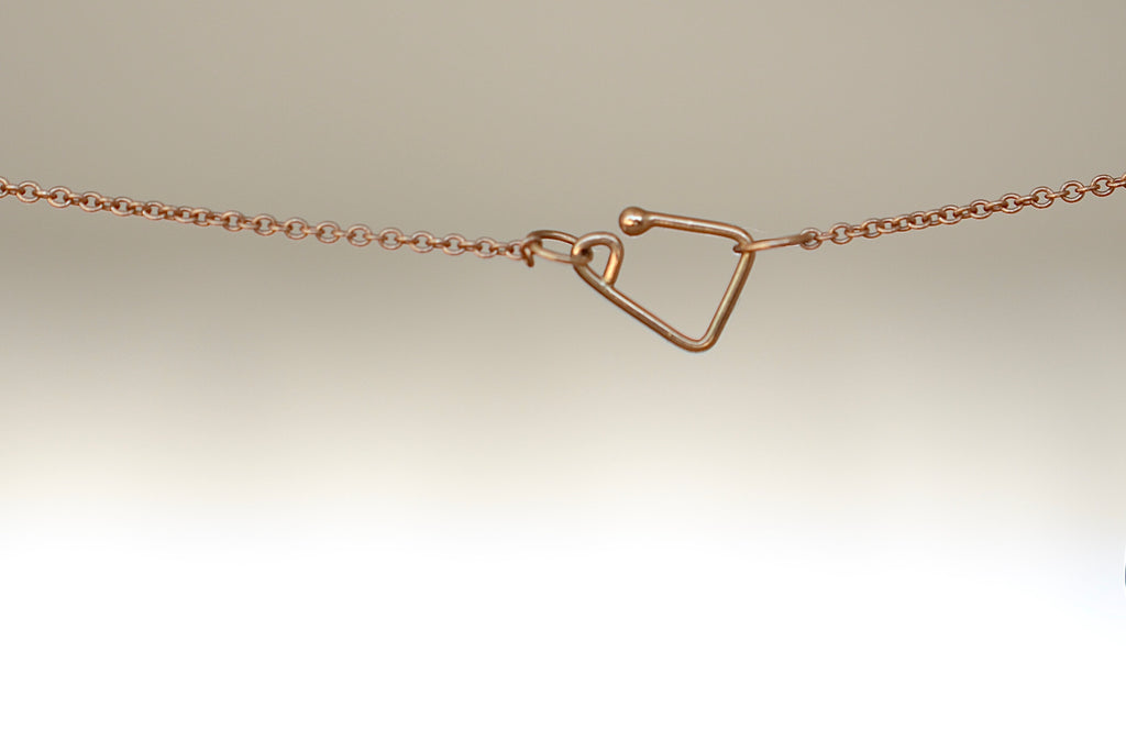 Kaylin Hertel signature clasp.