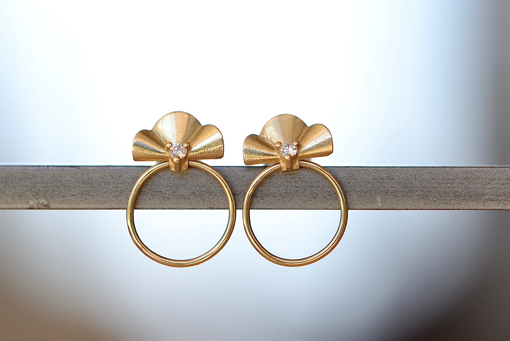 Open Earrings Small by Kaylin Hertel in 14k yellow gold with Canadian diamond and hoop on post closure.