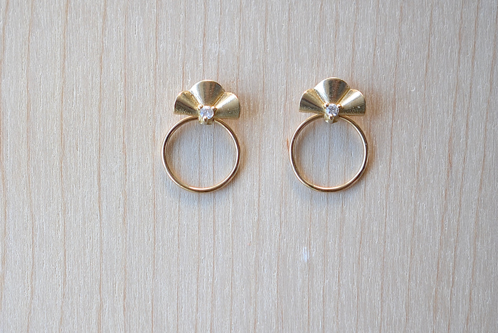 Open Earrings Small by Kaylin Hertel in 14k yellow gold with Canadian diamond and hoop on post closure.