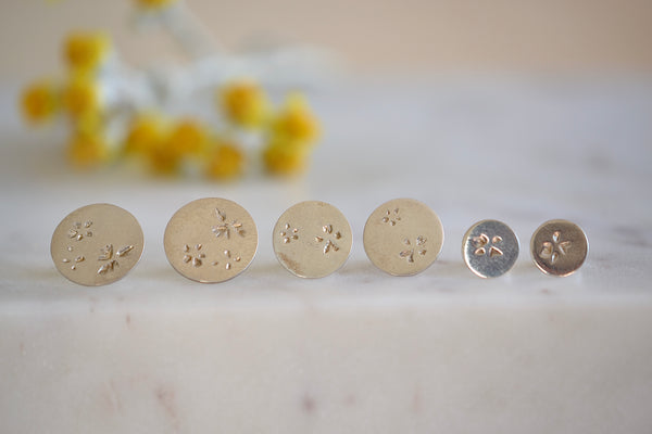 Kaylin Hertel Petal Dot Stud Earrings in 14k yellow gold with post closure in small, medium or large.