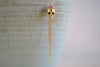Polly Wales Forbidden Skull Necklace 18k yellow recycled gold pink fuchsia sapphires long chain necklace pendant