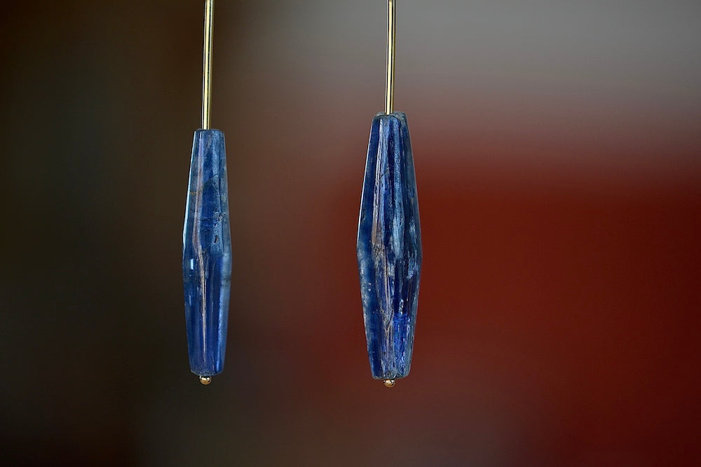 Kyanite on Stick and Strand Earrings by Kathleen Whitaker are One of a kind kyanite stones with natural inclusions that are drilled and prism shaped and attached to Kathleen Whitaker's signature stick and strand with post closure. Stone collection.